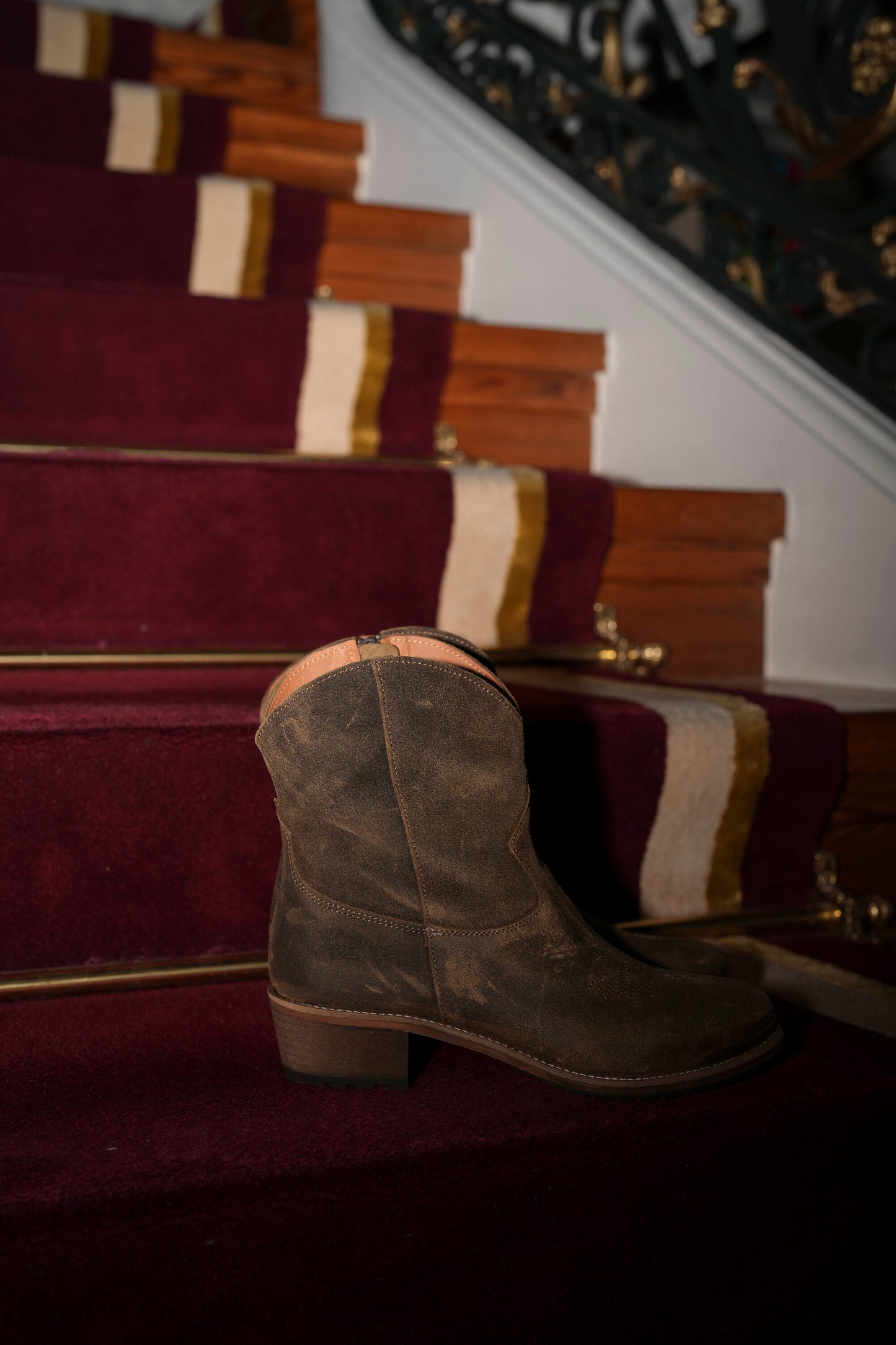 Botas em pele castanho