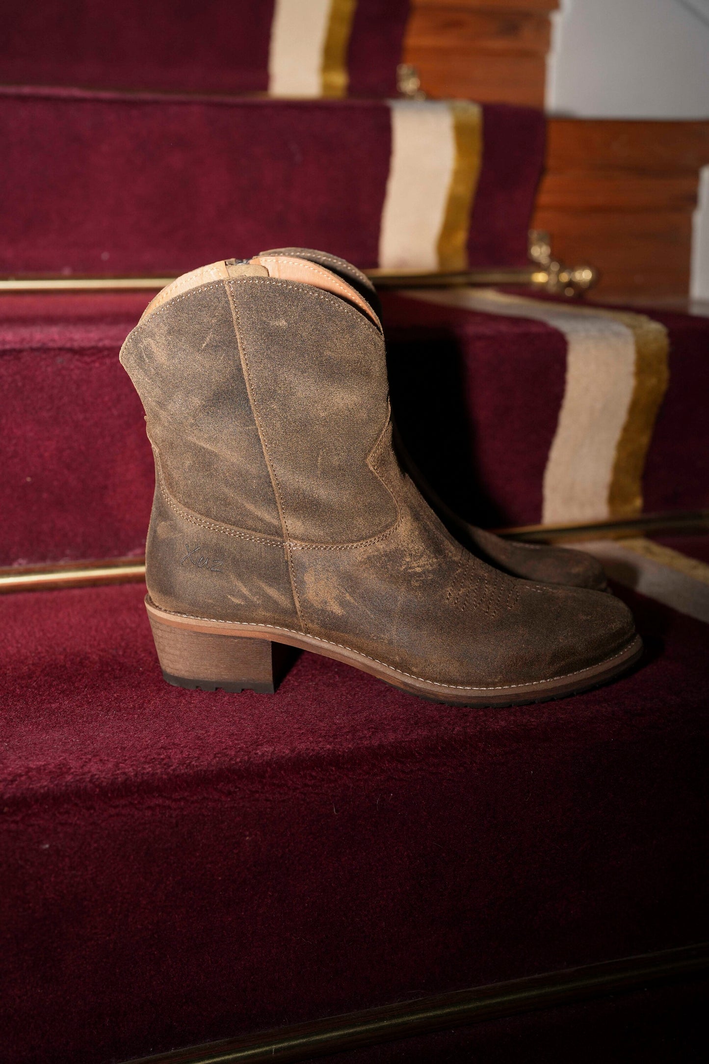 Botas em pele castanho