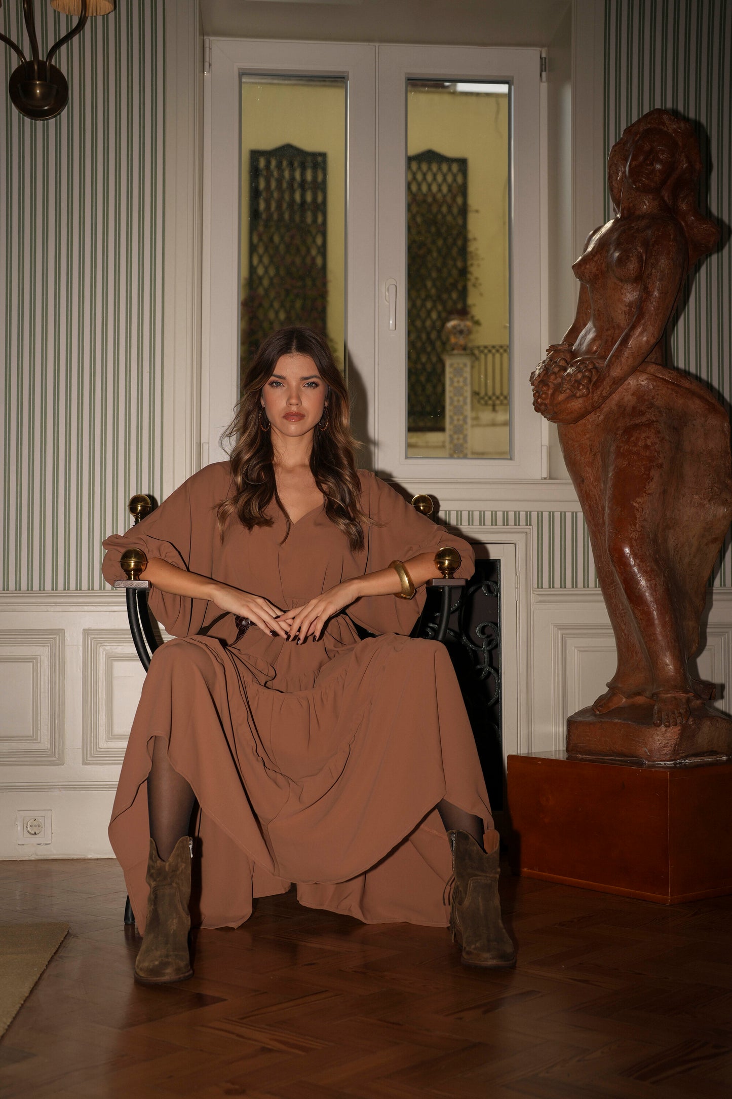 Botas em pele castanho com franjas