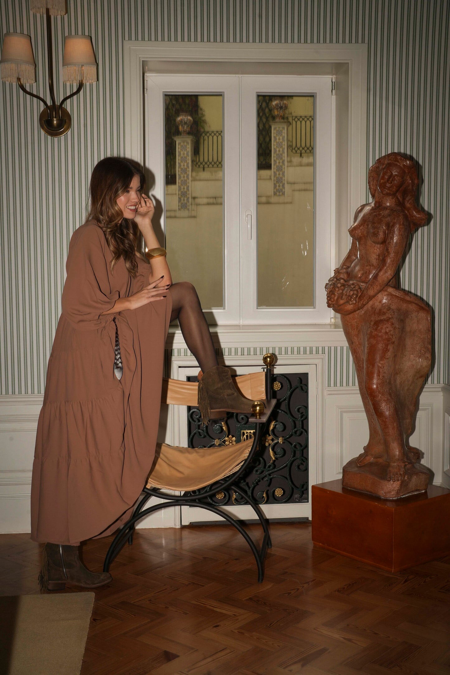 Botas em pele castanho com franjas