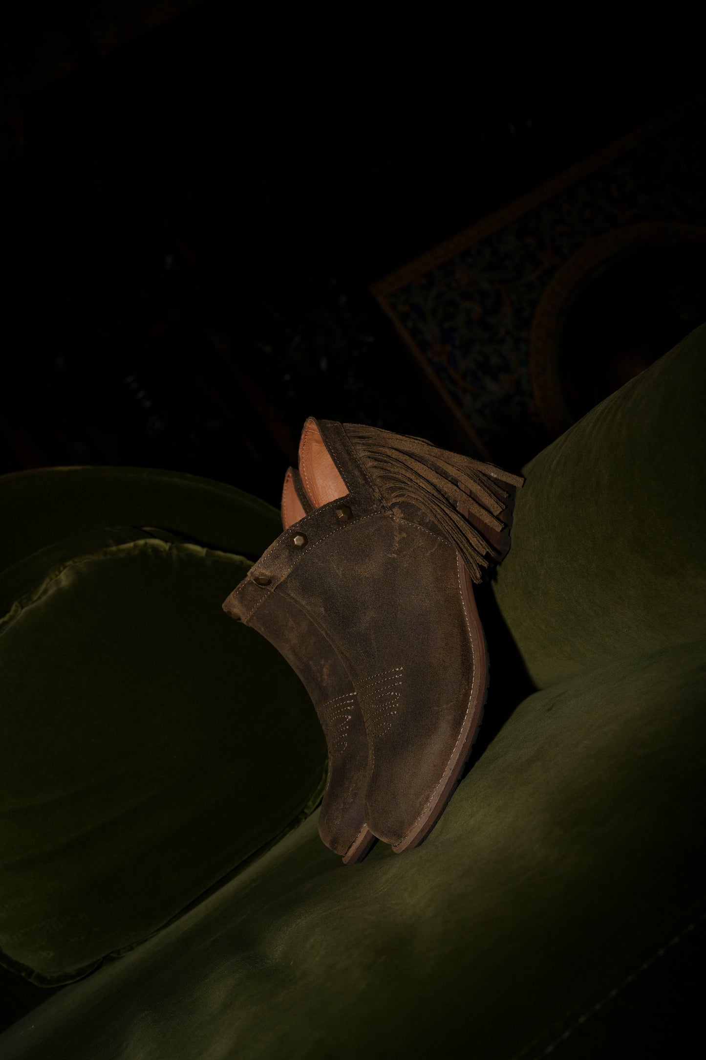 Botas em pele castanho com franjas