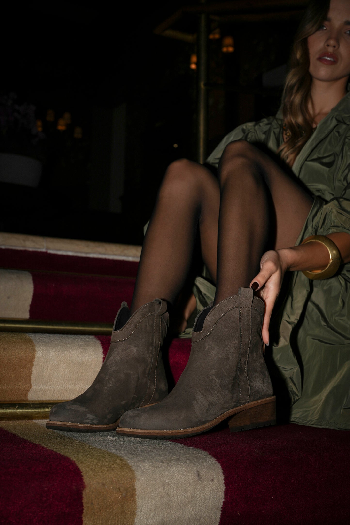 Botas em pele castanho