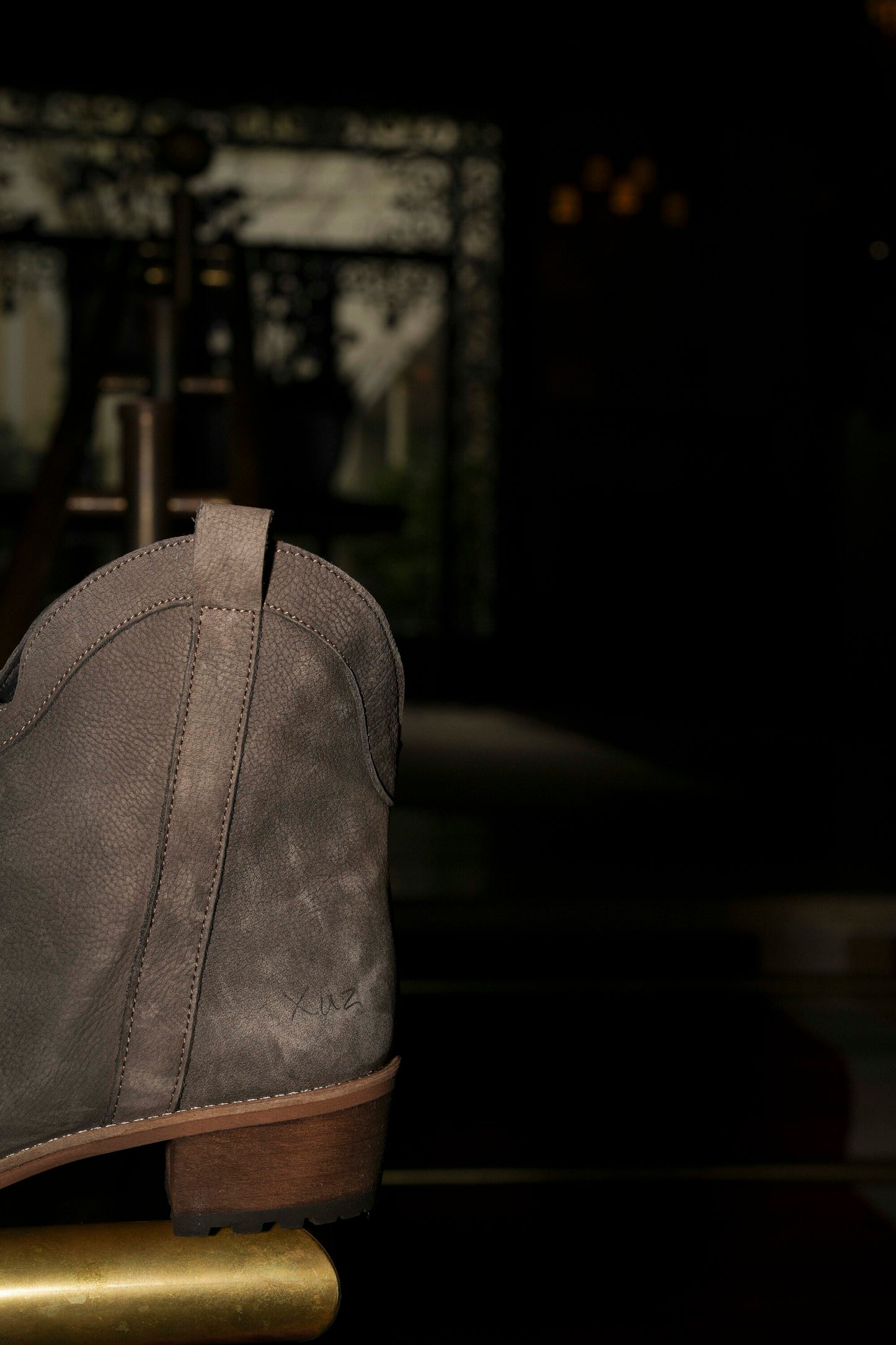 Botas em pele castanho